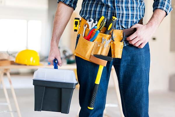 Male construction worker providing home improvement services