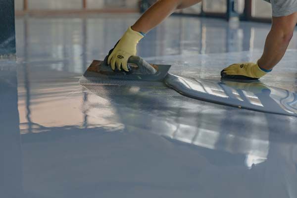 Epoxy flooring and foundation installation by garage remodelers in Central Arkansas