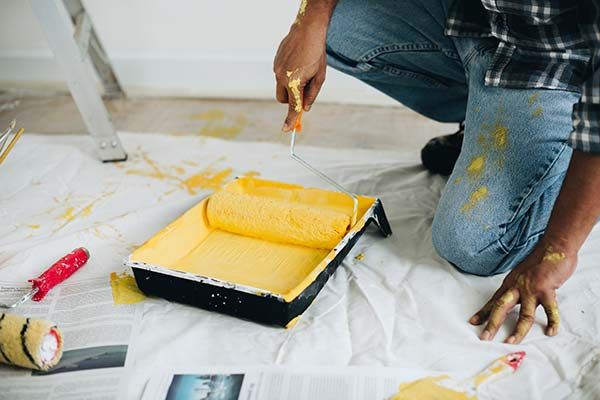 Professional painter providing interior painting services