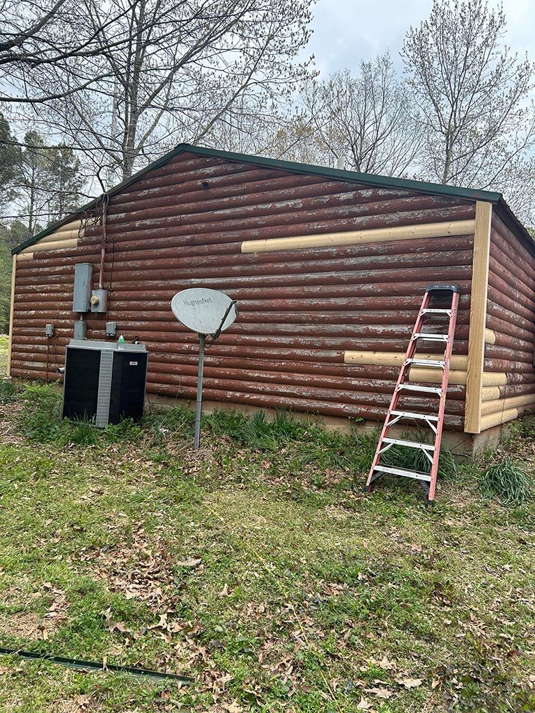 Log house home repair and restoration project with fence installation